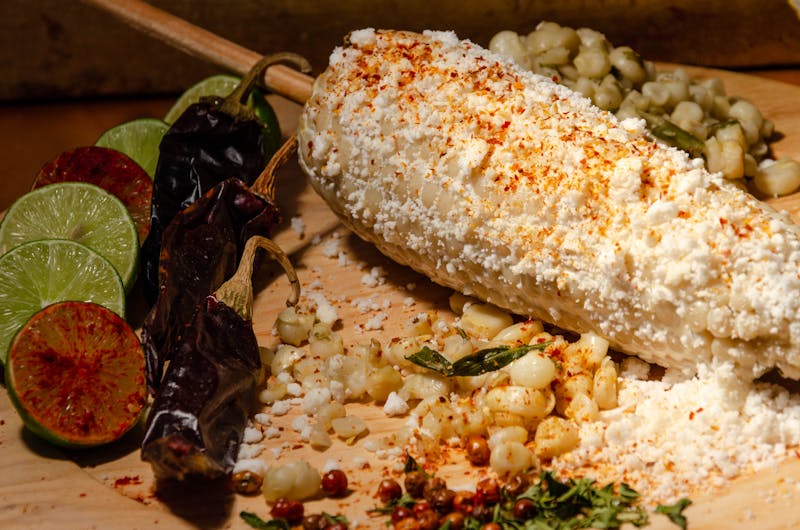 Mexican Street Corn Elote with cotija and chili powder