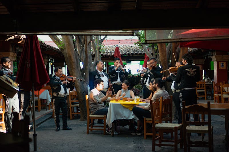 Cabana Taco team members working together in a warm kitchen environment